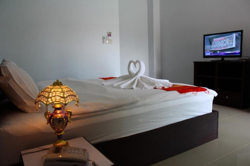 The Family Grand Hotel Udon Thani Quarto foto